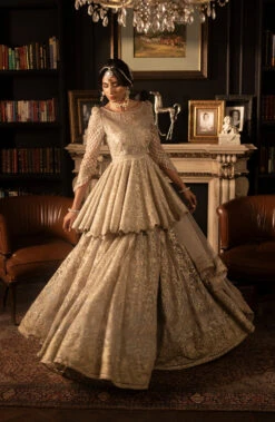 Pakistani Bridal Dress In Ivory Peplum Lehenga Style 13 Pakistani Bridal Dress In Ivory Peplum Lehenga Style -LuxPak Bridal Studio Store ElegantPakistaniBridalDressinIvoryPeplumLehengaStyle