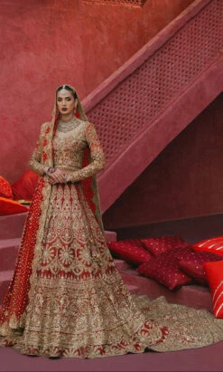 Pakistani Bridal Dress In Red Choli And Lehenga Style