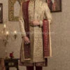 Pakistani Gold Sherwani For Groom With Red Shawl #GR110 1 Pakistani Gold Sherwani For Groom With Red Shawl #GR110 -LuxPak Bridal Studio Store PakistaniGoldSherwaniforGroomwithRedShawl